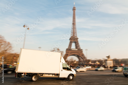 White Delivery Van At The Eiffel Tower