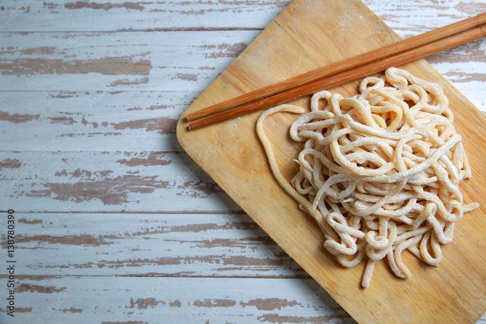 egg noodles on cutting board egg noodles on cutting board