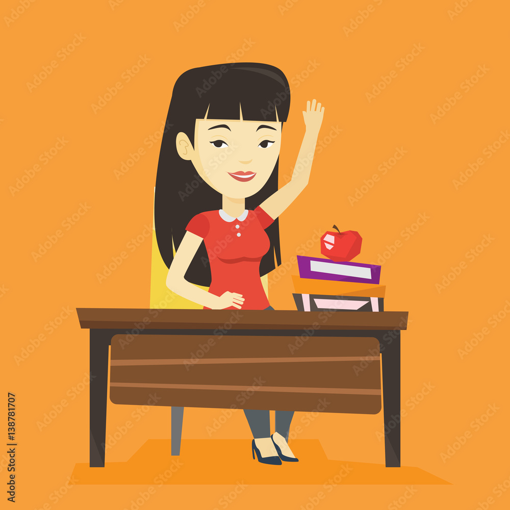 Student raising hand in class for an answer. Student raising hand in class for an answer.