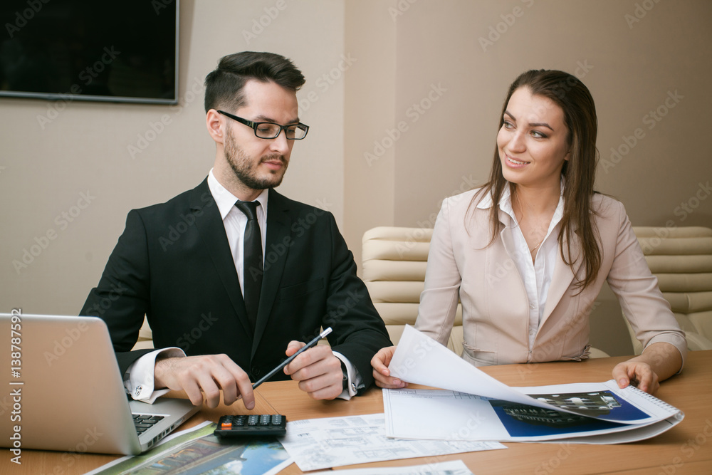 Couple meeting in office Couple meeting in office