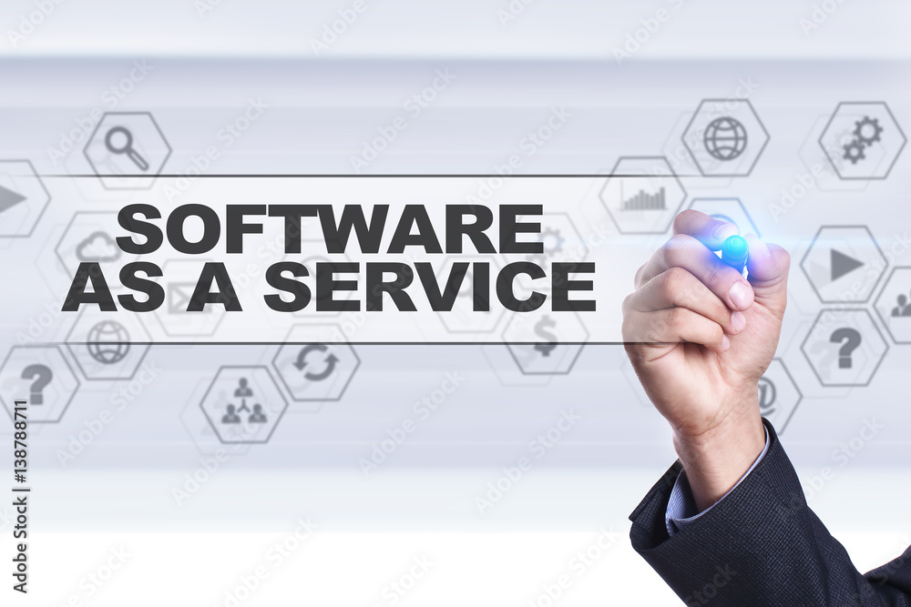 Businessman drawing on virtual screen. software as a service concept. Businessman drawing on virtual screen. software as a service concept.