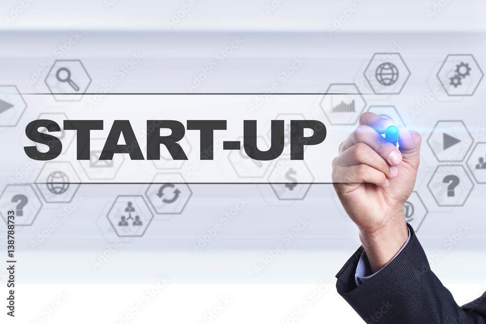 Businessman drawing on virtual screen. start-up concept. Businessman drawing on virtual screen. start-up concept.