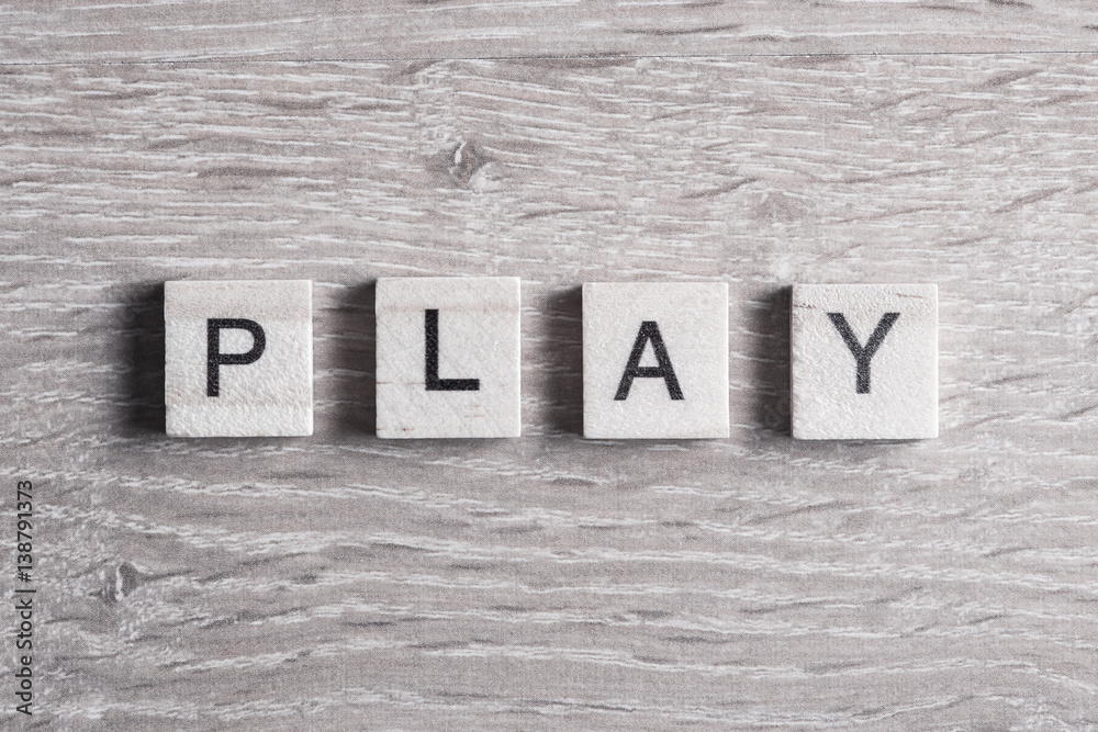 wooden elements with letter collected to word play wooden elements with letter collected to word play