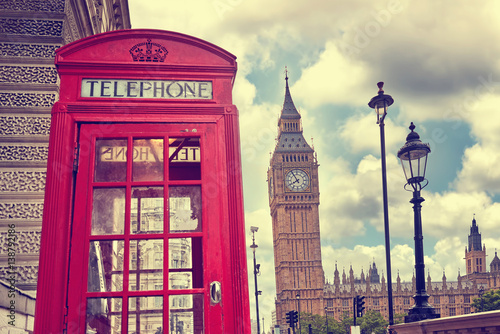 London - Big Ben tower and a red phone booth. Vintage film effect. Instagram filter