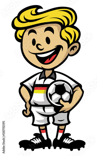 Little soccer player posing with the ball