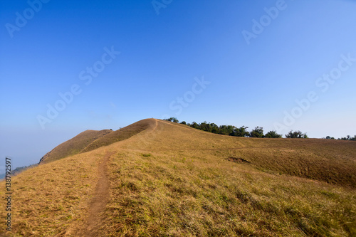 beautiful view top of mountain at evening light with blue sky in Doi Mon jong  Chiang Mai  Thailand. subject is blurred