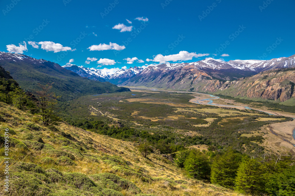 Argentina, Patagonia, El Chalten area. Trekking to the Laguna Capri and Fitz Roy Mountain. Landscape view to the river Rio de las Vueltas valley. Sky with the clouds.