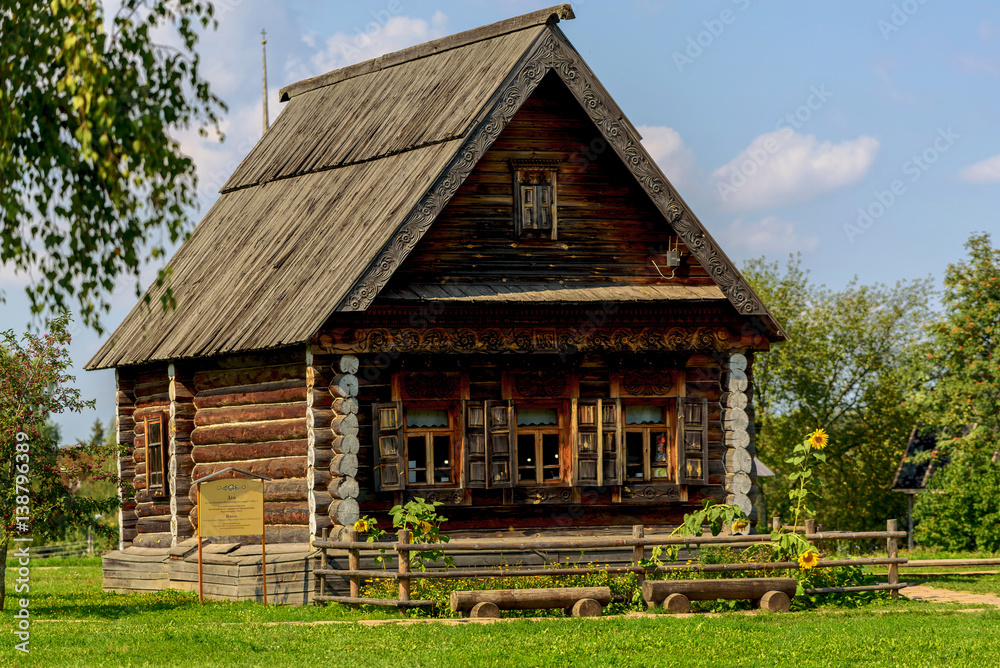 Old wooden rustic house a sunny summer day. Old wooden rustic house a sunny summer day.
