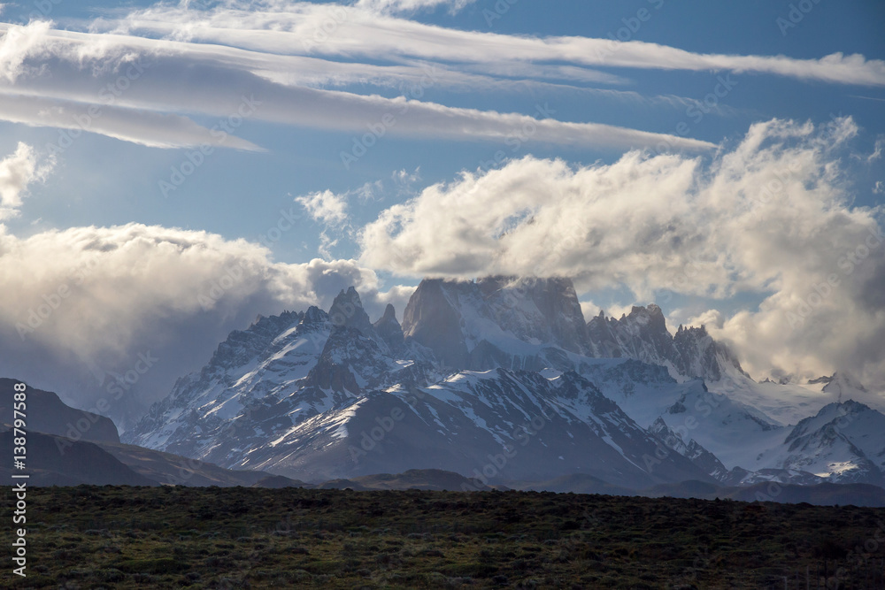 Argentina, Patagonia. Beautiful patagonian landscape with beautiful cloudy sky and mountains covered with snow.