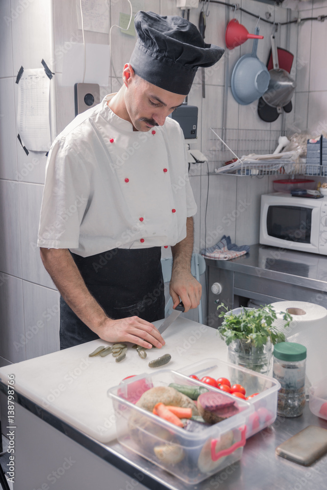 one chef kitchen cutting pickles