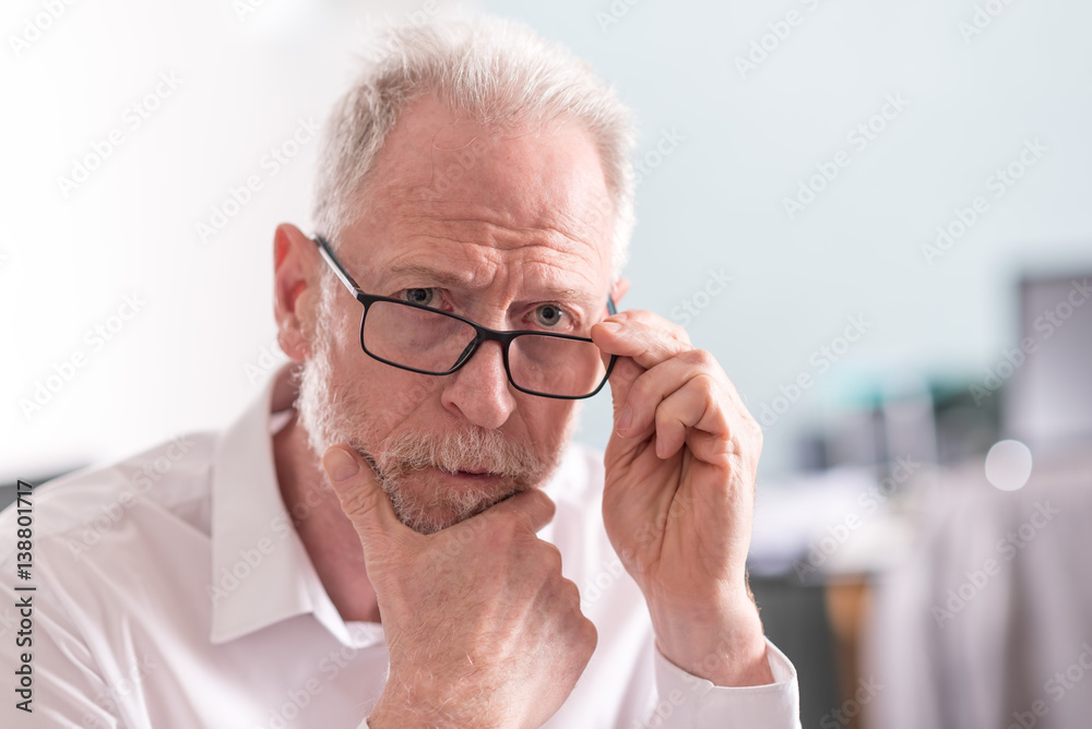 Thoughtful senior businessman