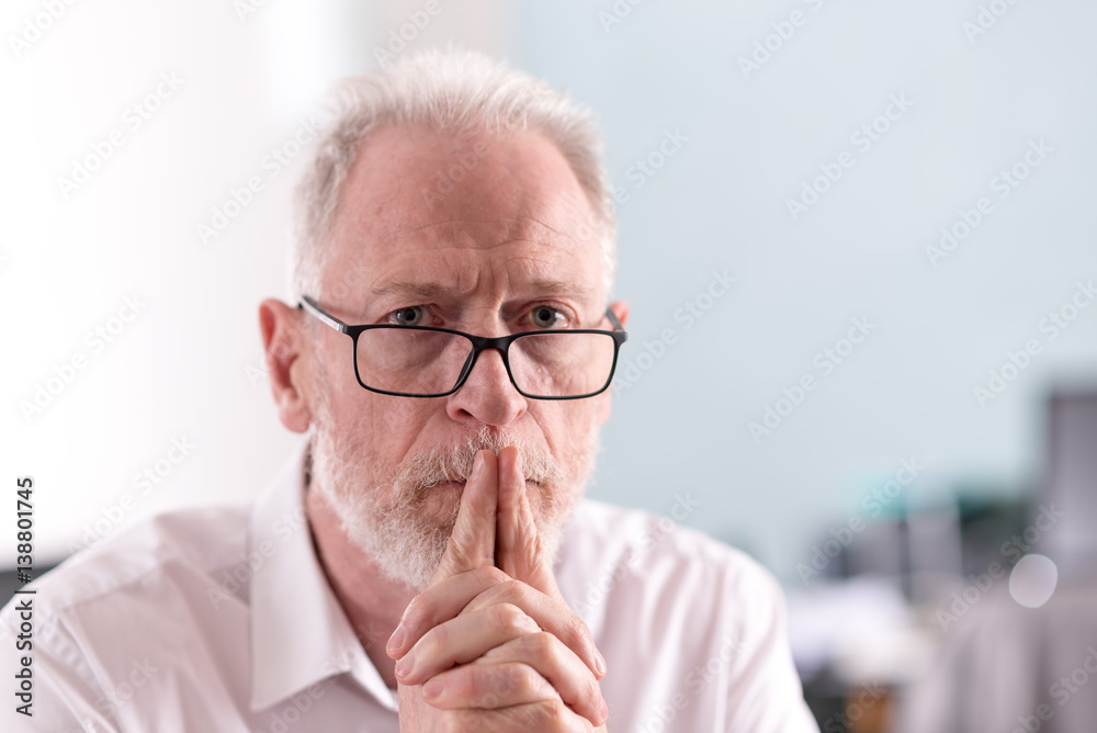 Thoughtful senior businessman Thoughtful senior businessman