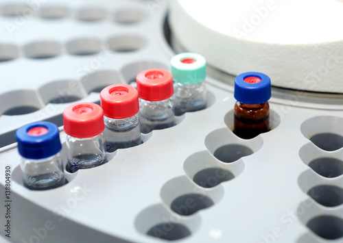  Bottles check on the quality of the suspension. Quality Control Laboratory medicine. Chromatograph operation.