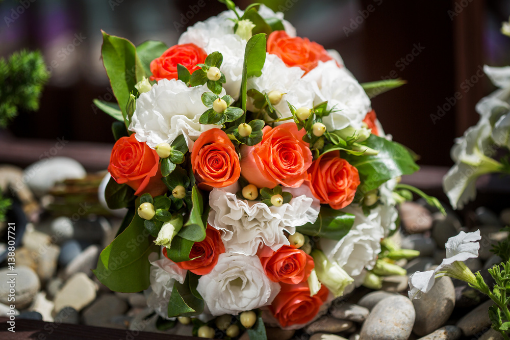 Wedding bouquet of bride colorful roses