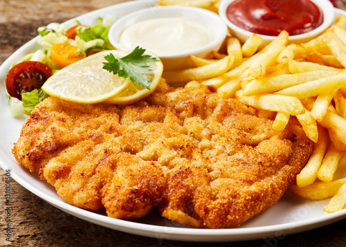 Schnitzel and French fries dish