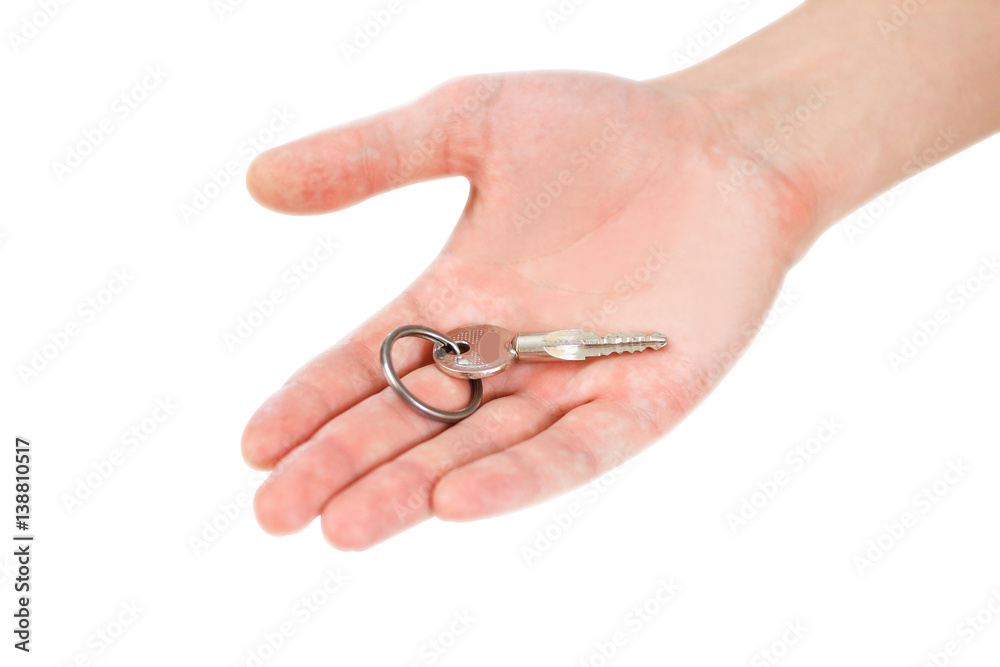 Keys in hand. Isolated on white background.