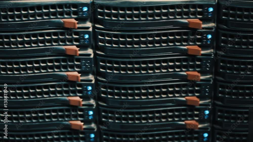 Working data servers with flashing LED lights. server type. Should one server rack in a server room Working data servers with flashing LED lights. server type. Should one server rack in a server room