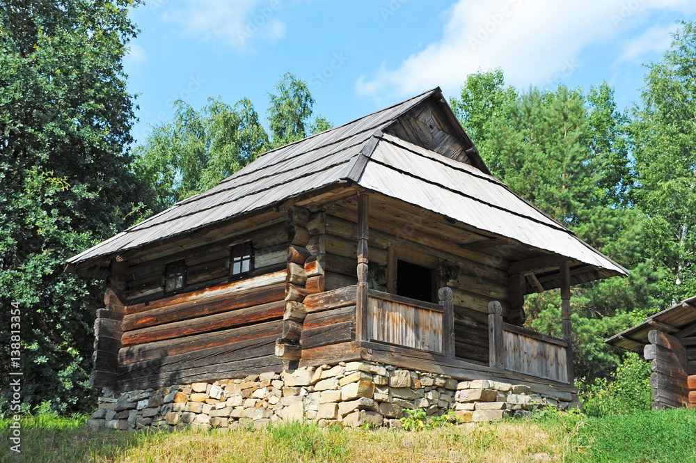 Ancient carpatian hut in forest Ancient carpatian hut in forest