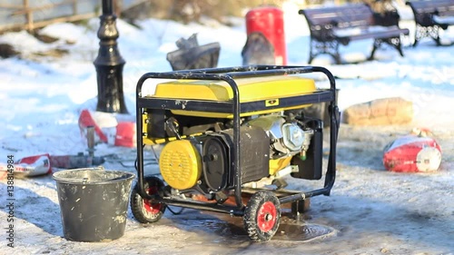 Diesel generator in work in the winter street