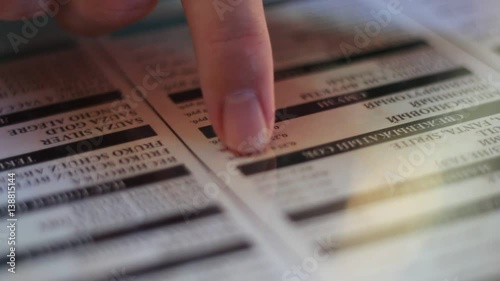 Choosing a dish from the menu in restaurant