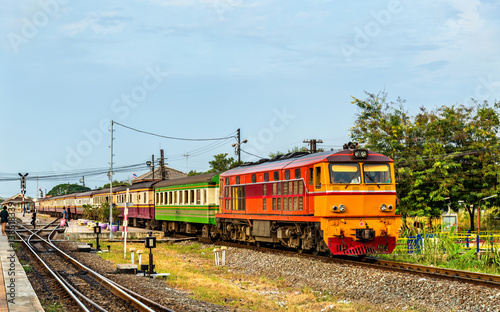 Passenger train for Bangkok departs from Ayutthaya station