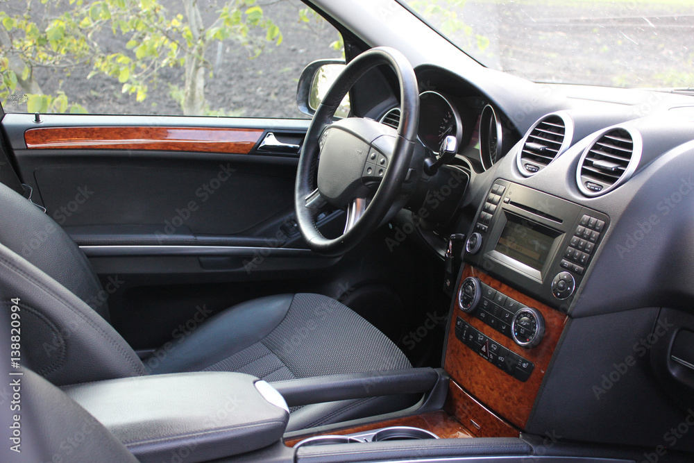  Car interior luxury service. Car interior details.  View of the interior of a modern automobile showing the dashboard