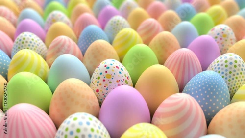 Beautiful multi coloured Easter eggs in rows. Seamless loopable animation. Computer generated footage. Perfect for easter backgrounds.
