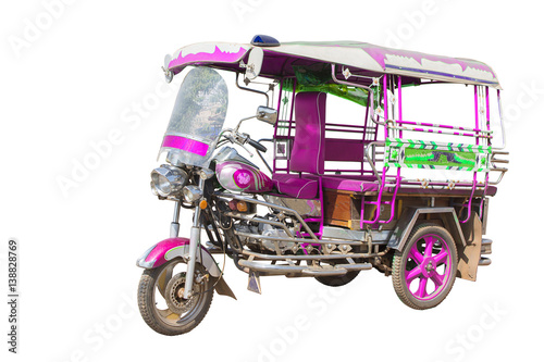  A three-wheeled taxi cab isolated on white background with clipping path.