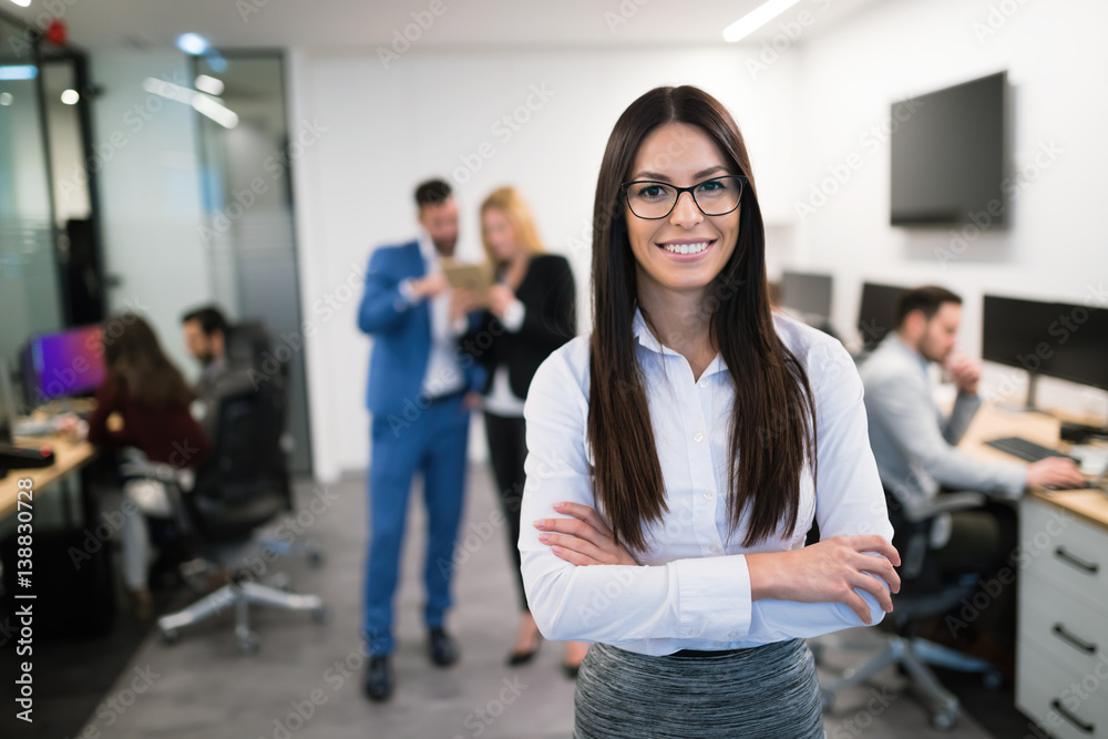 Business woman in officess representing company Business woman in officess representing company
