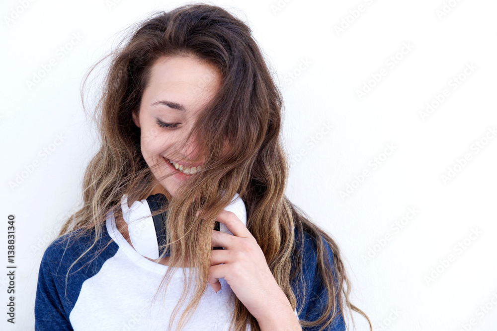 beautiful young woman with headphones laughing beautiful young woman with headphones laughing