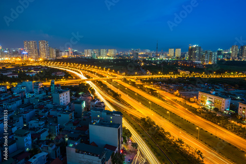 Hanoi cityscape at Thang Long multiple land highway at night.
