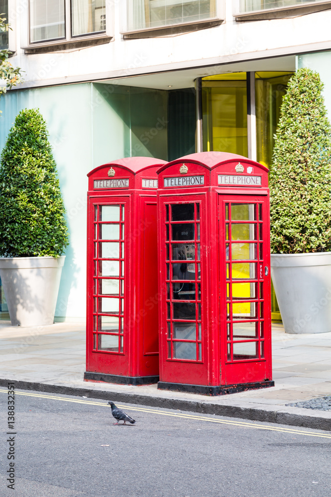 Obraz premium Two Red Phone Booths in London