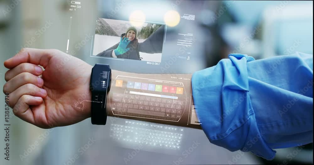 A man answers the wife who smiles and waves from the phone that appears in hologram clock futuristic and technological. Concept: network, communication,family, technology, augmented reality and future