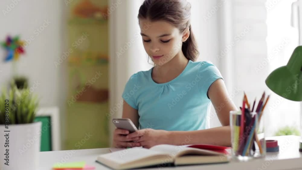 girl with smartphone distracting from homework girl with smartphone distracting from homework