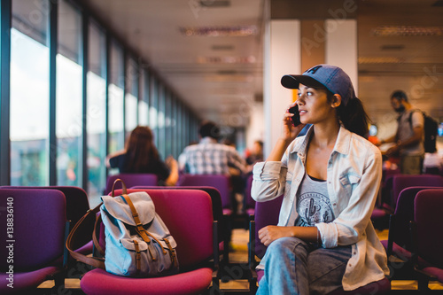 Young woman waiting at airport lounge