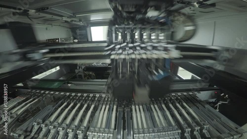 Quick Movement and Robotic Machine Precise Work Closeup photo