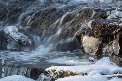 Beautiful ice on river photo