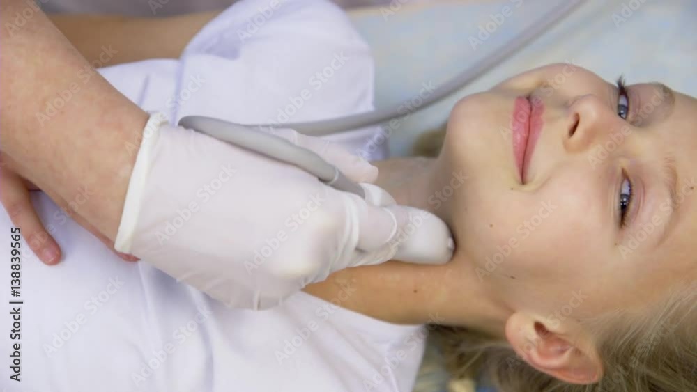 girl in the hospital doing ultrasound