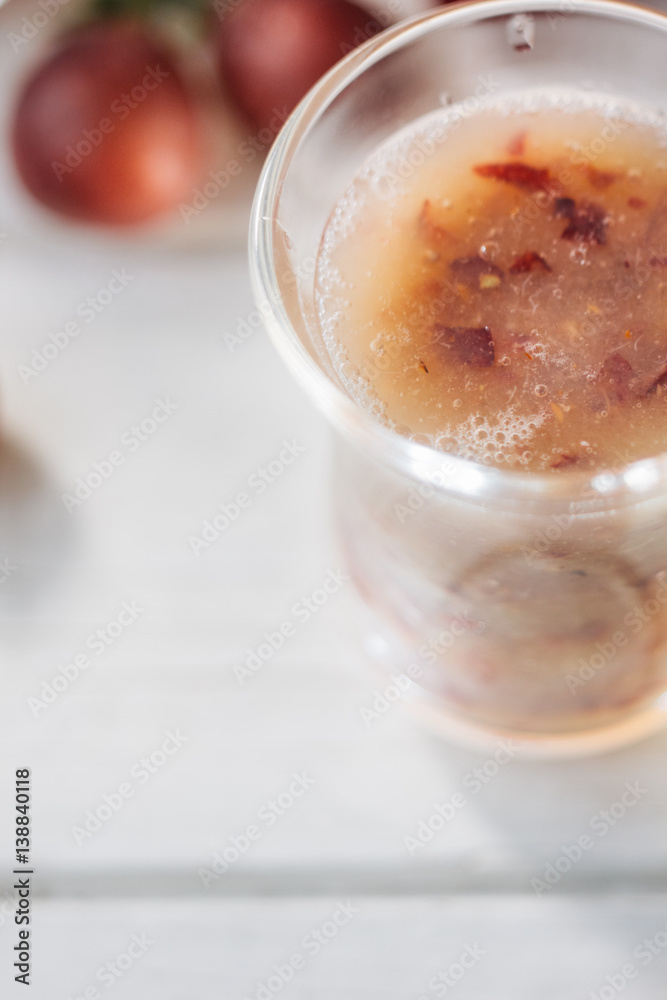 Grape smoothie over the white table. Grape smoothie over the white table.