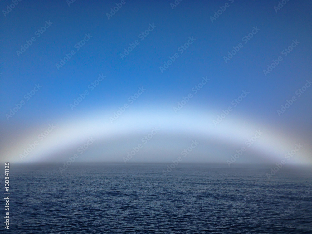 Haze rainbow on ocean