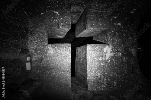 Christian Cross Sculpture carved in rock in Salt Cathedral of Zipaquira, Colombia photo