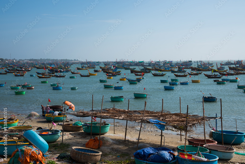 Fisherman village view point and pan boats in Mui-Ne city, Vietnam