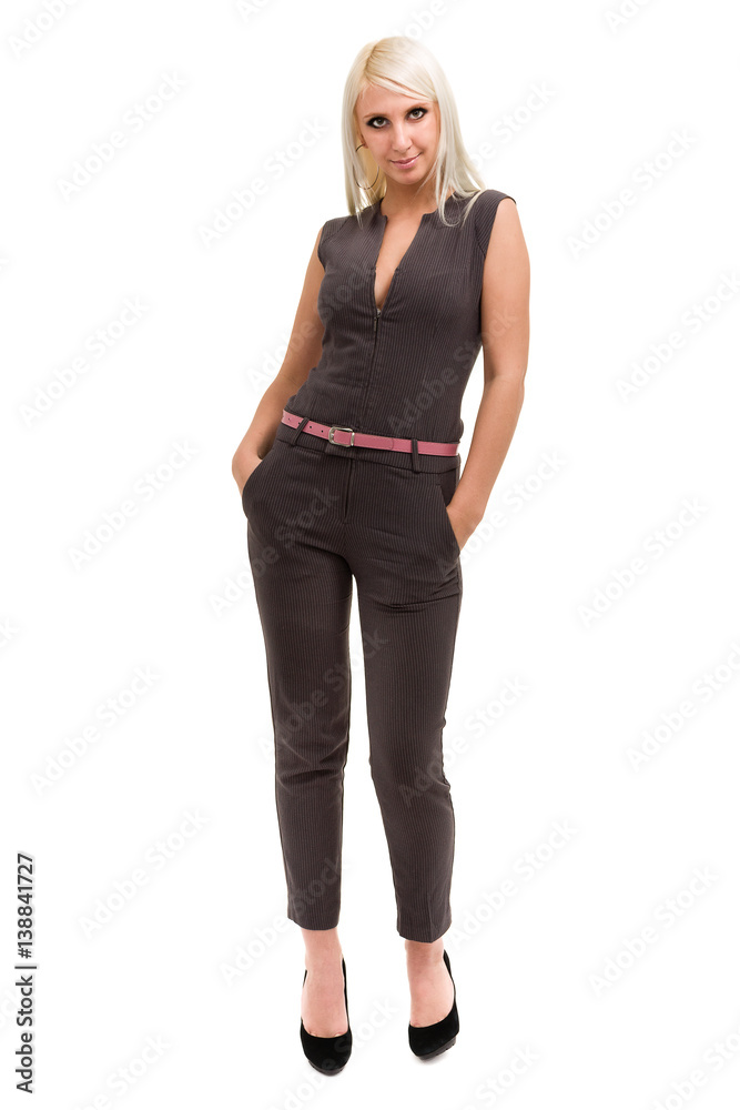 Fototapeta premium Full length of a beautiful young woman in overall standing over white