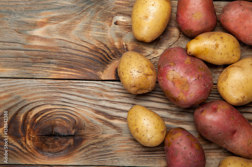 Potatoes on a rustic background