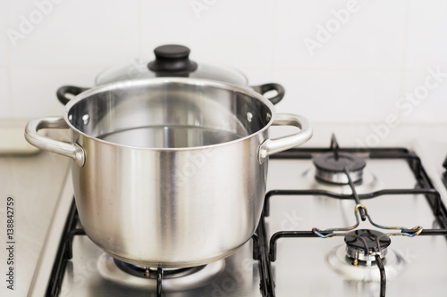 stainless steel cooking pot on gas stove