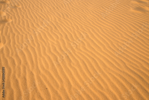 Sand waves at "Red sand dune" in Mui-Ne city, Vietnam