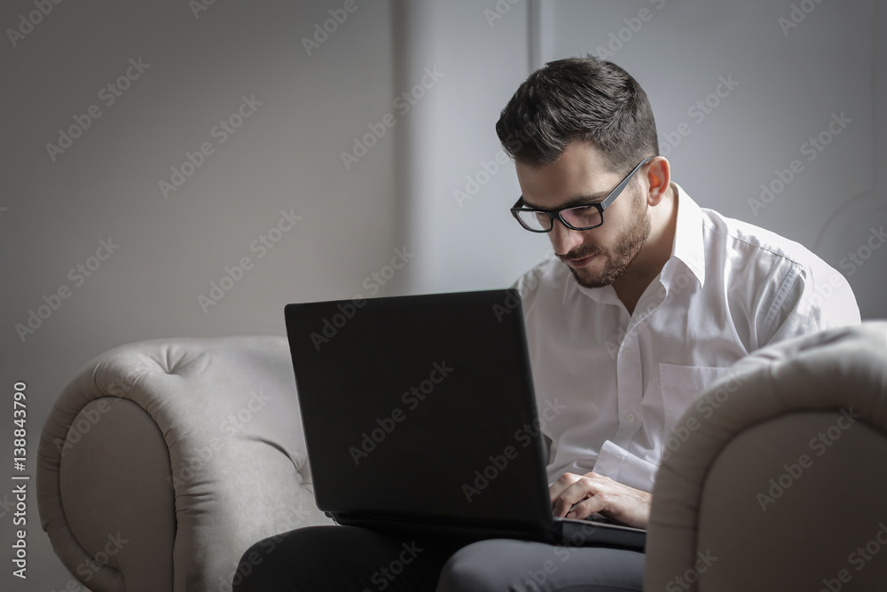 Man working at his laptop Man working at his laptop