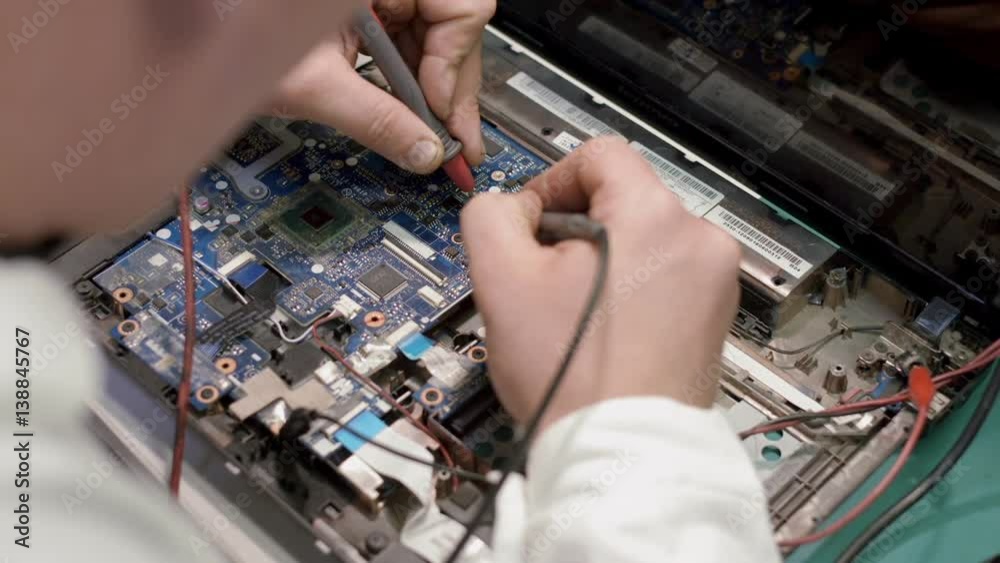 Shot soldering a circuit board with a soldering iron Shot soldering a circuit board with a soldering iron