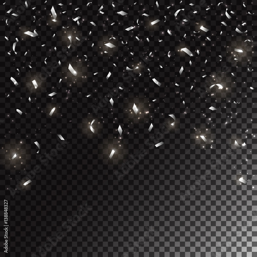 Silver holiday confetti on dark transparent background