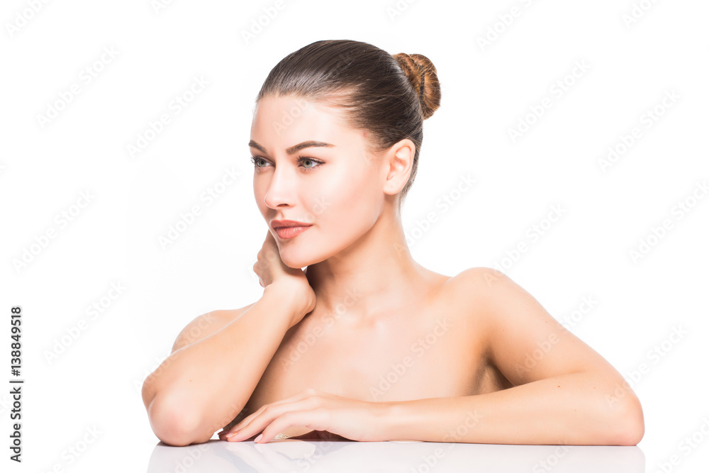 Beauty Portrait. Beautiful Spa Woman Touching her Face. Perfect Fresh Skin. Isolated on White Background. Pure Beauty Model. Beauty Portrait. Beautiful Spa Woman Touching her Face. Perfect Fresh Skin. Isolated on White Background. Pure Beauty Model.